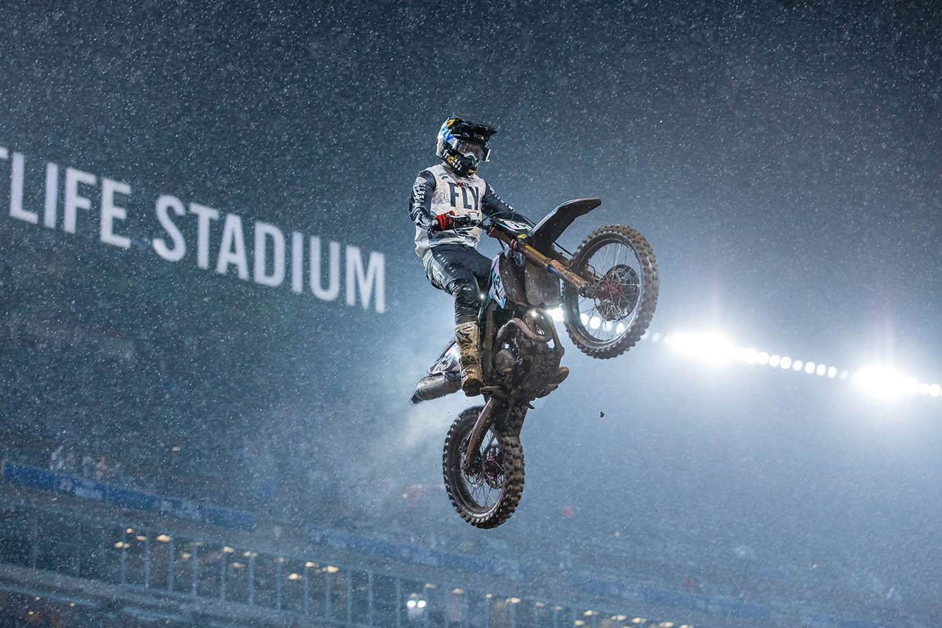 Max Anstie flying through the air as rain falls at the East Rutherford AMA Supercross event | Credit: Jeff Kardas