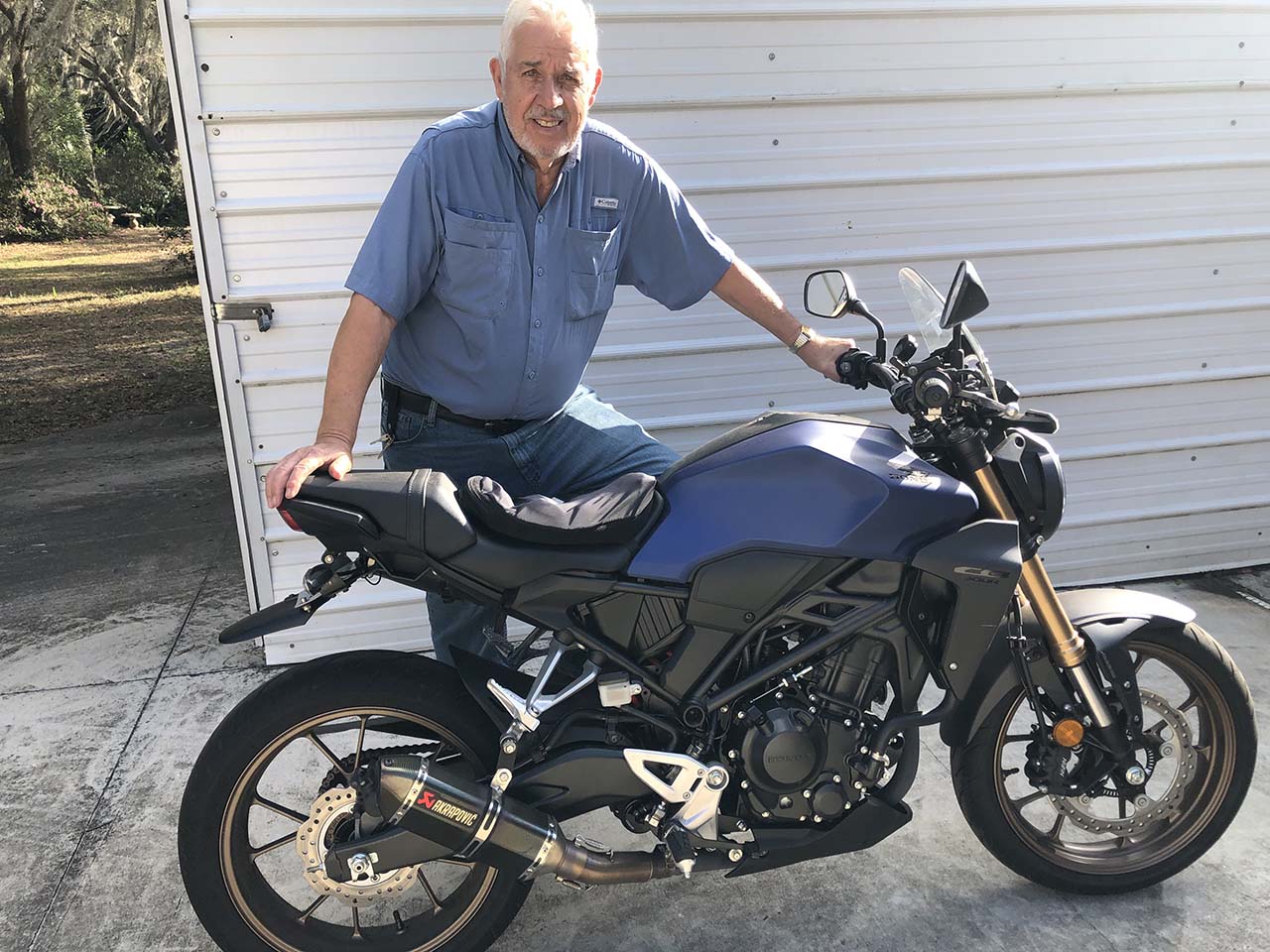 Author and a Honda CB300R