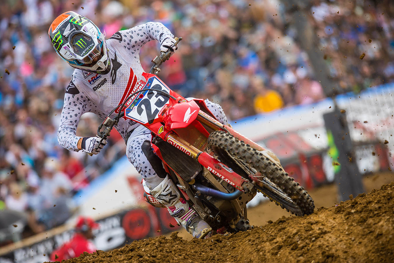 Chase Sexton kicking up dirt while racing at the Nashville AMA Supercross event