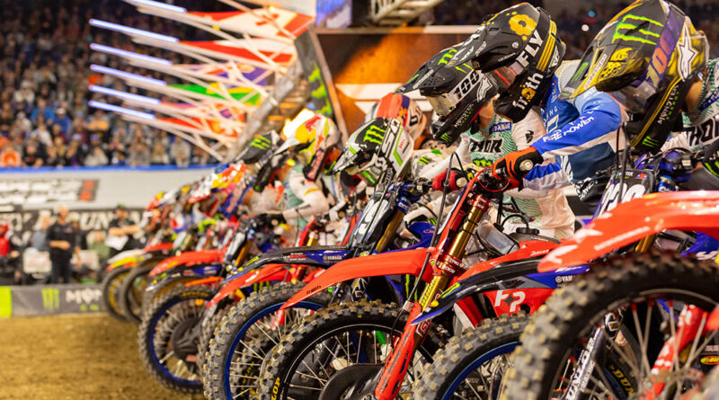 The riders all lined up for a race to begin at Indianapolis AMA Supercross