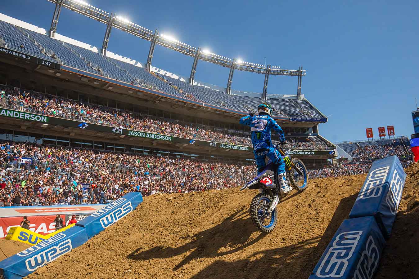 Eli Tomac acknowledging the crowd at Denver AMA Supercross | Credit: Jeff Kardas