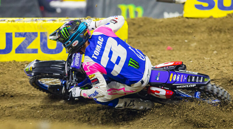 Eli Tomac banks a turn at Detroit AMA Supercross | Credit: Jeff Kardas